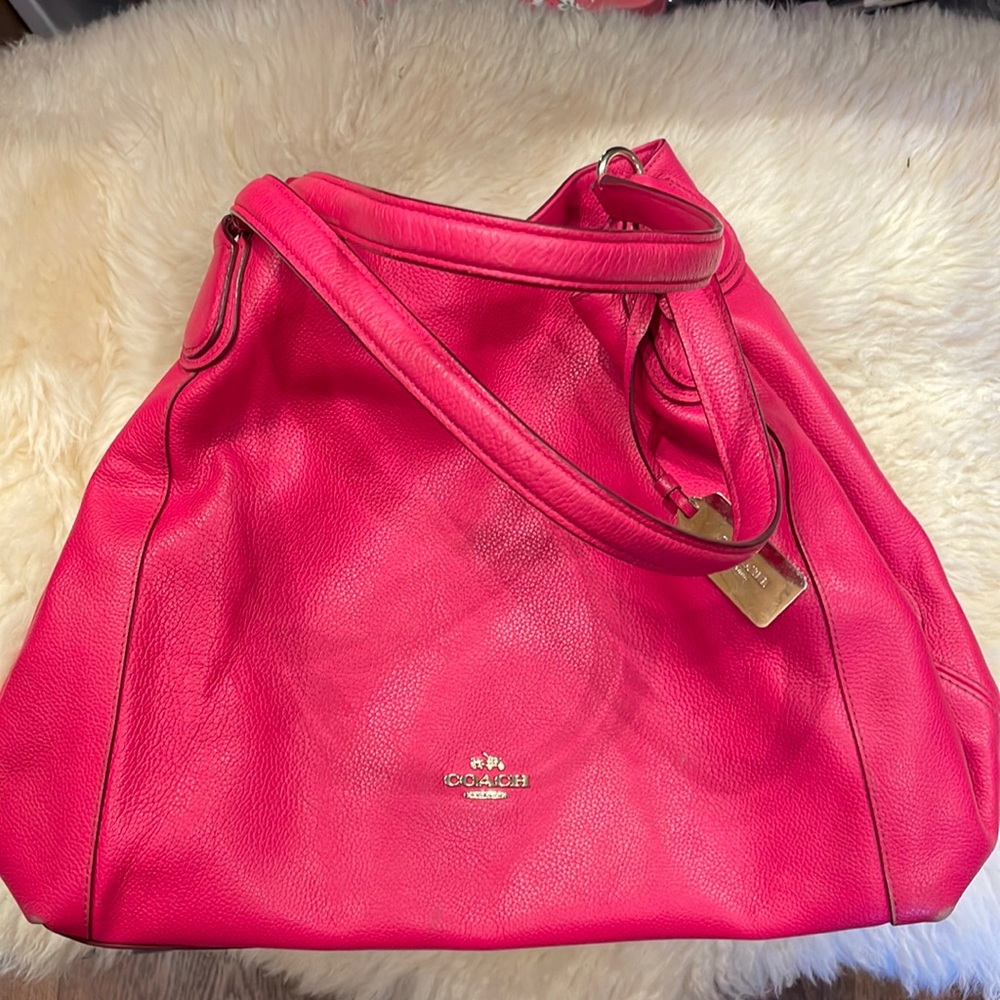 Genuine leather hot pink Coach purse.  Lots of room.  Non smoking home.